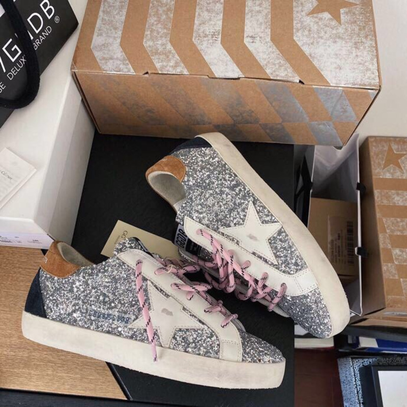 golden goose men’s S*per-star sneakers with sliver glitter and brown heel tab